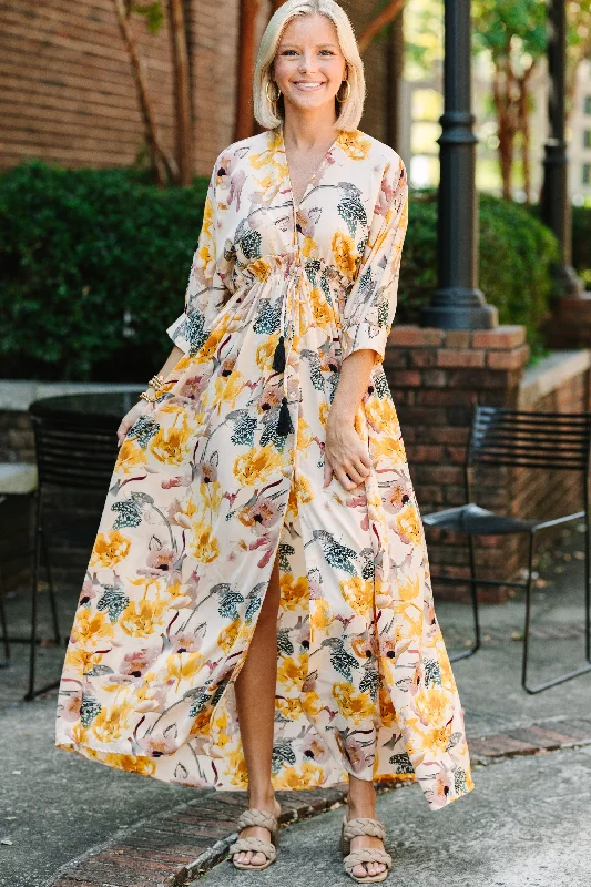 Women's floral dress interview -It's A Match Beige Floral Maxi Dress